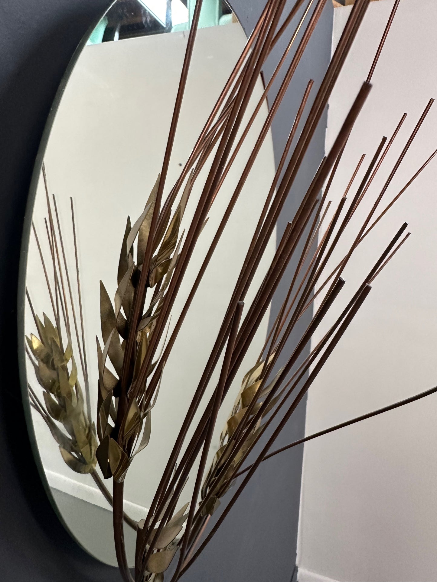 Vintage 1981 Curtis Jere round wall mirror with brass wheat stalk design, mid-century modern decor
