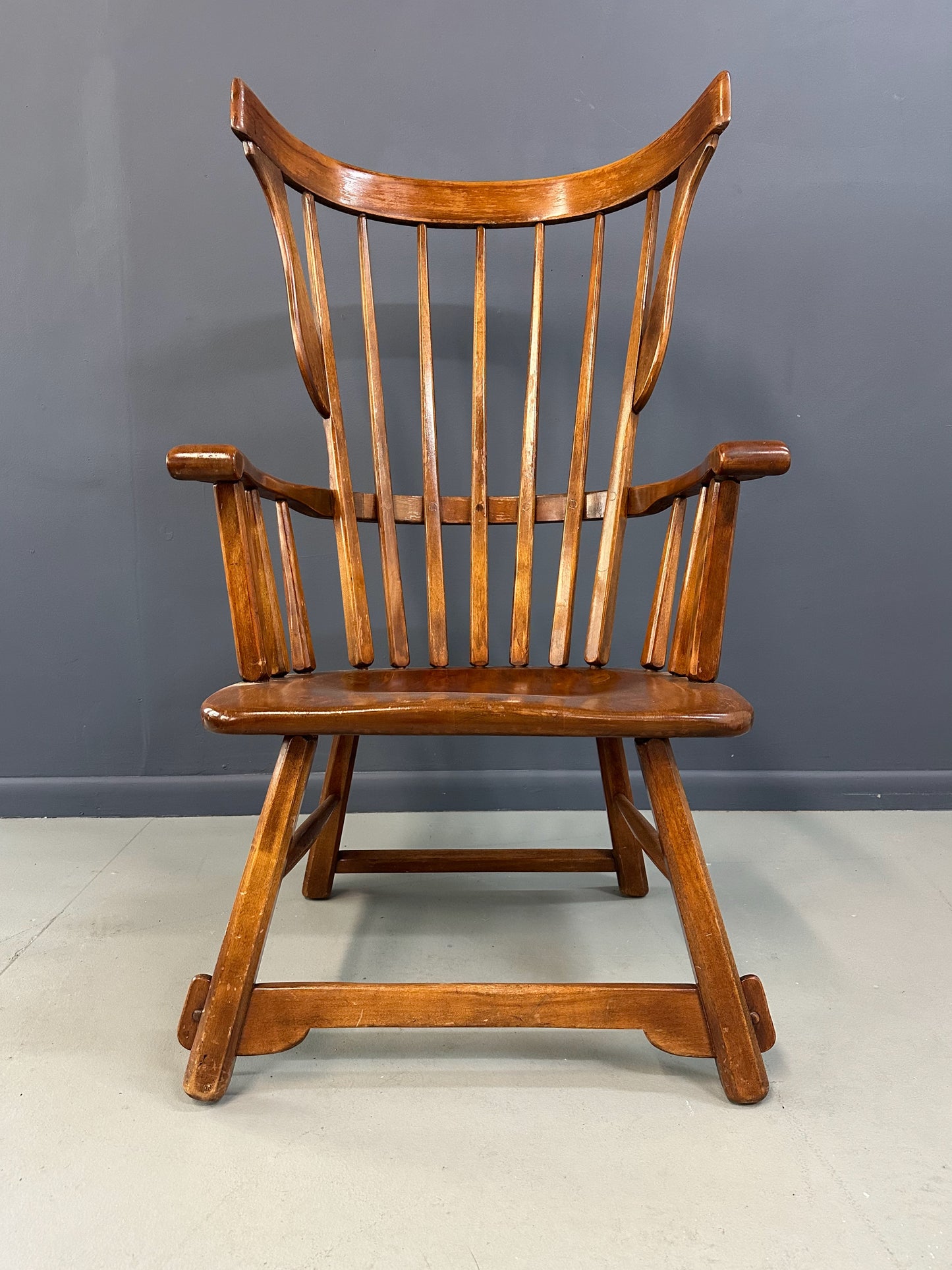 Grand Windsor chair designed by Herman de Vries for The Sikes Company, featuring curved crest rail, vertical spindle back, and contoured wooden seat
