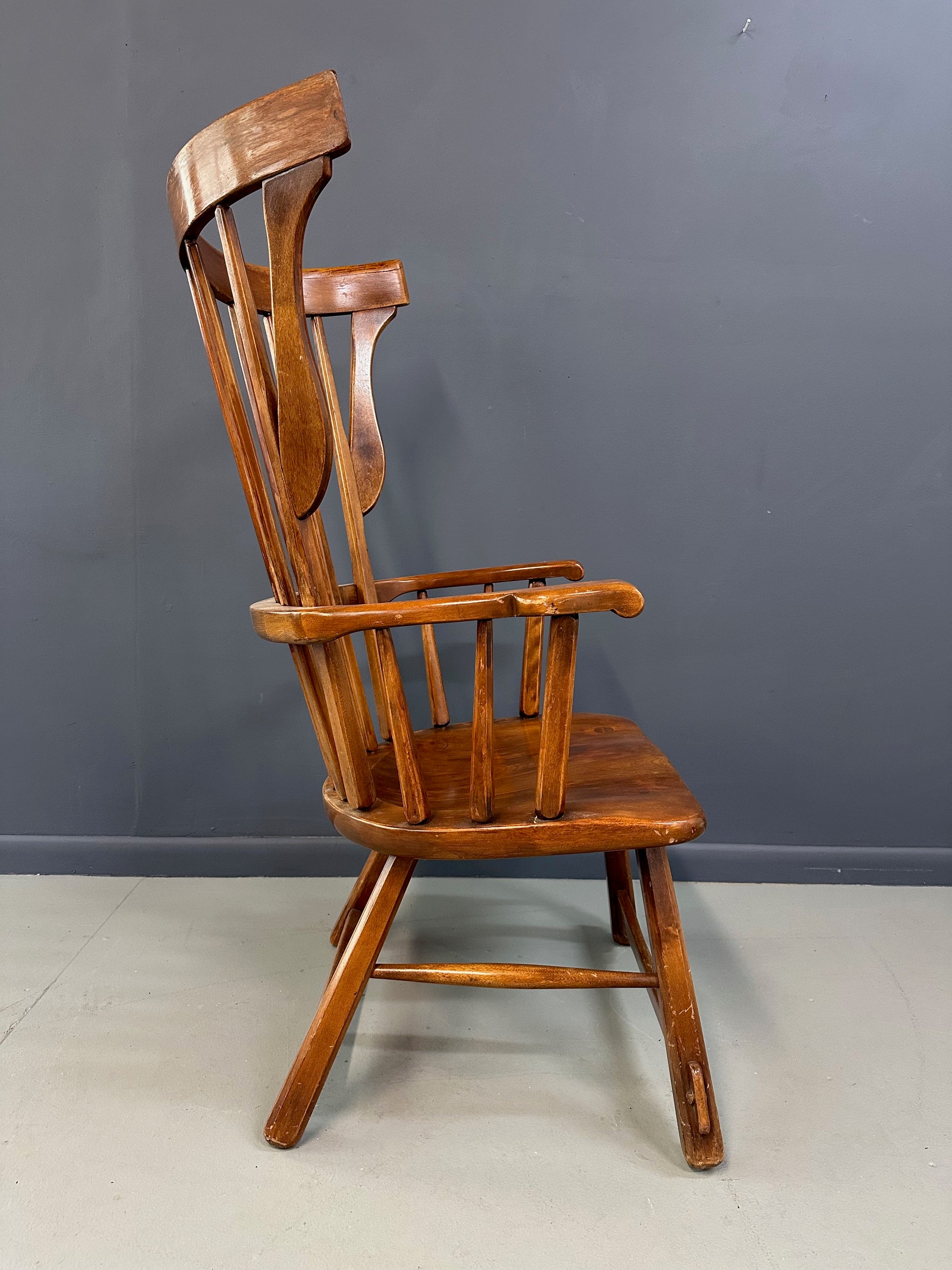 Grand Windsor chair designed by Herman de Vries for The Sikes Company, featuring curved crest rail, vertical spindle back, and contoured wooden seat