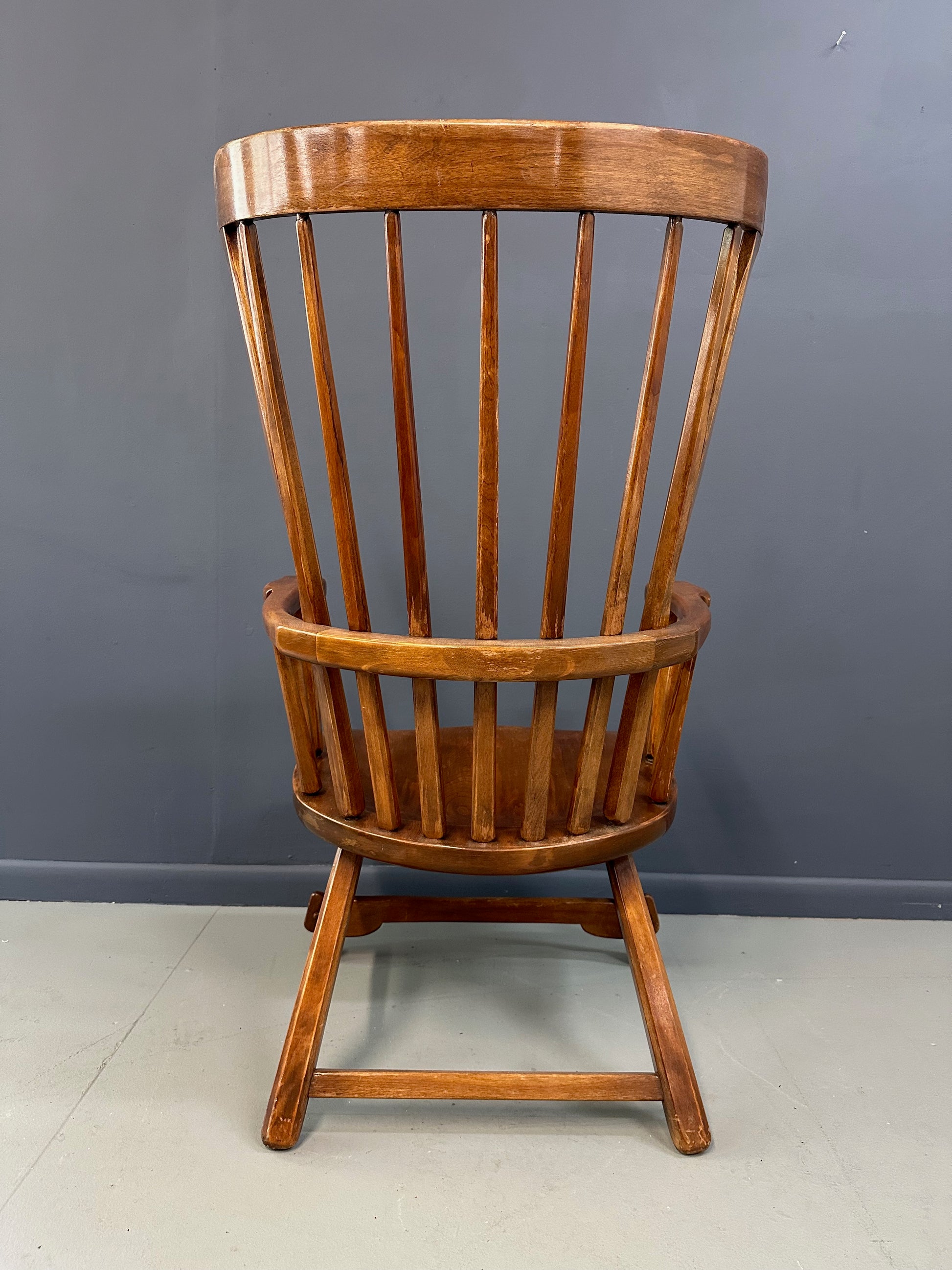 Grand Windsor chair designed by Herman de Vries for The Sikes Company, featuring curved crest rail, vertical spindle back, and contoured wooden seat