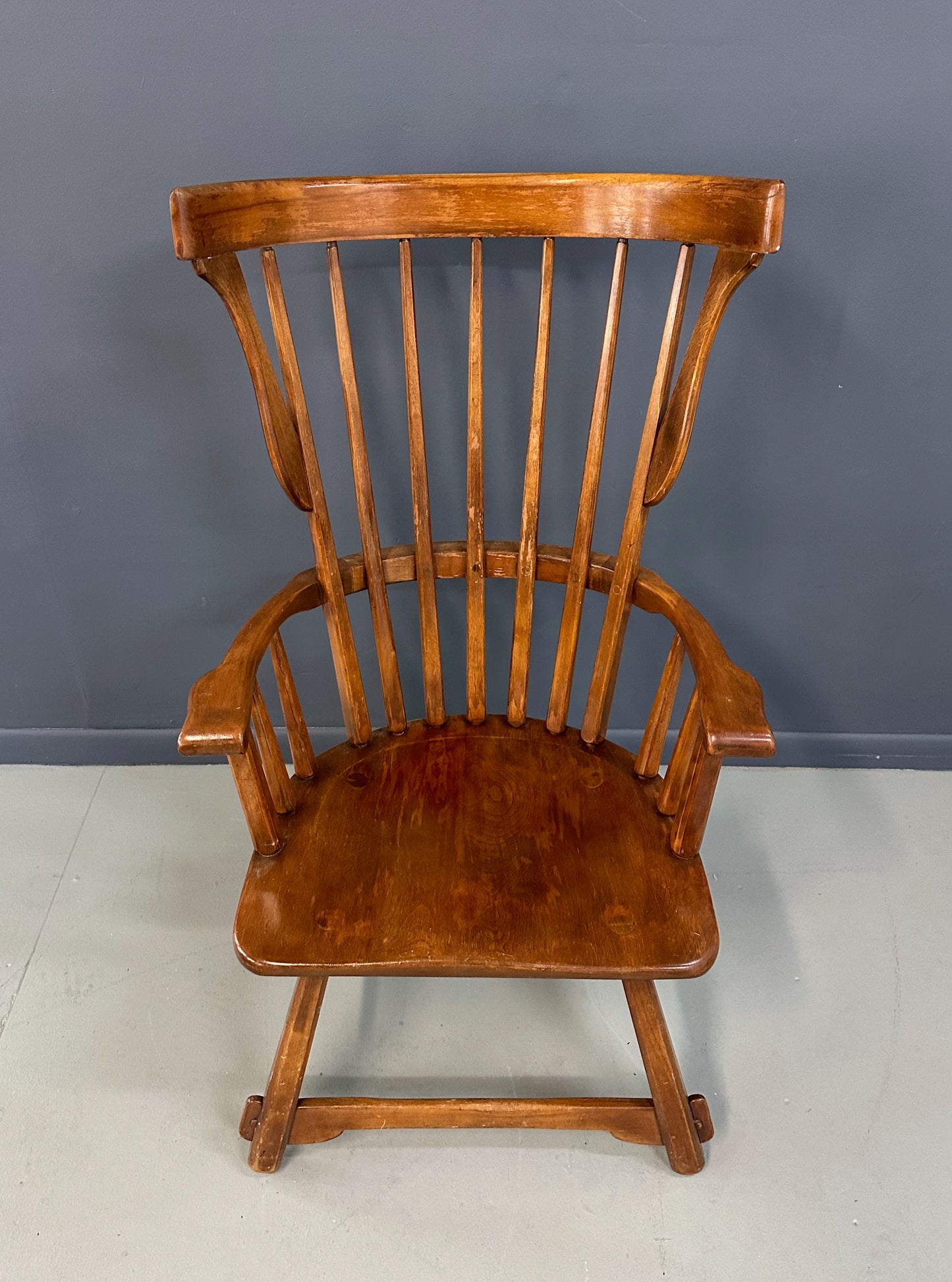 Grand Windsor chair designed by Herman de Vries for The Sikes Company, featuring curved crest rail, vertical spindle back, and contoured wooden seat