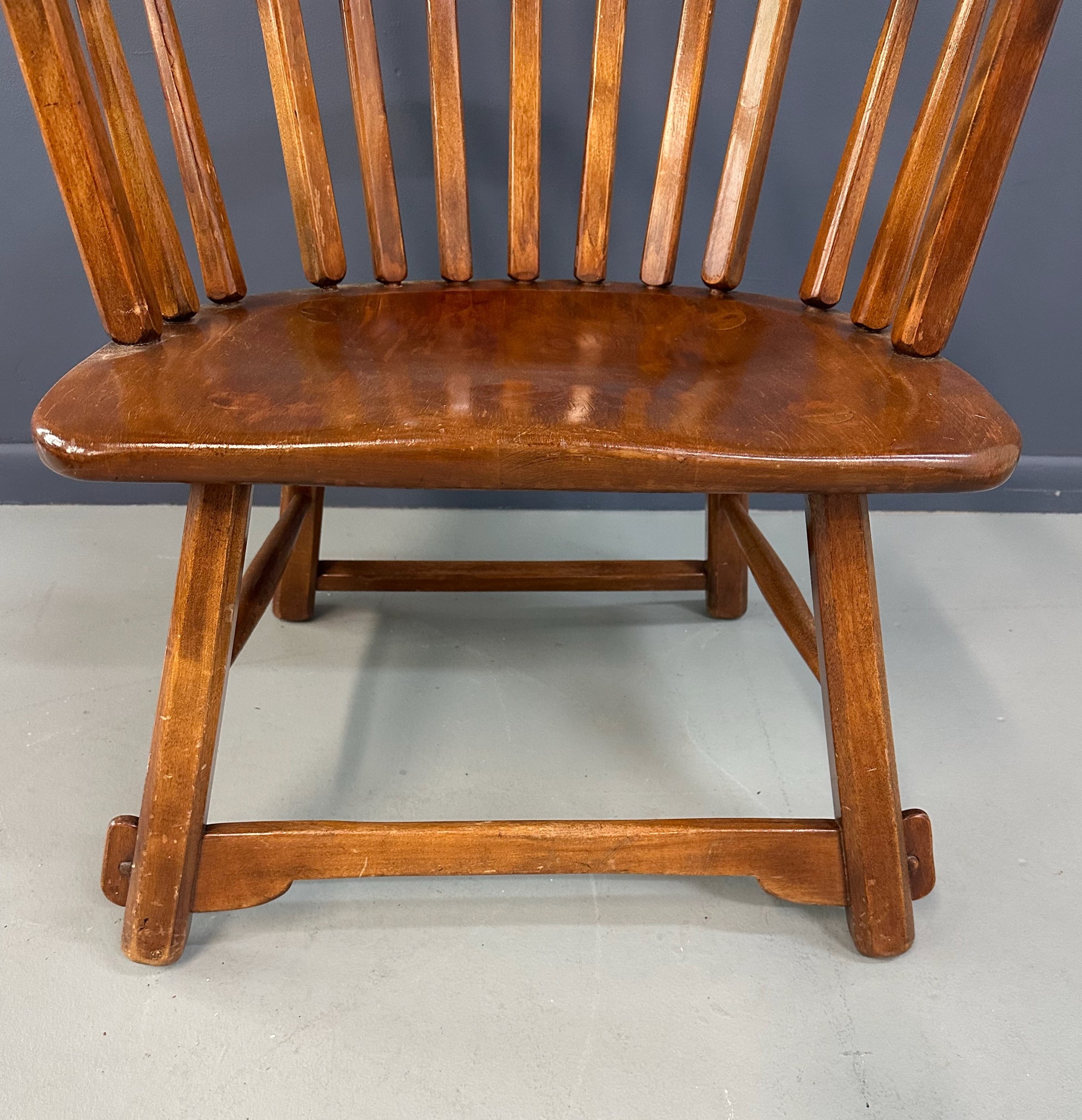 Grand Windsor chair designed by Herman de Vries for The Sikes Company, featuring curved crest rail, vertical spindle back, and contoured wooden seat