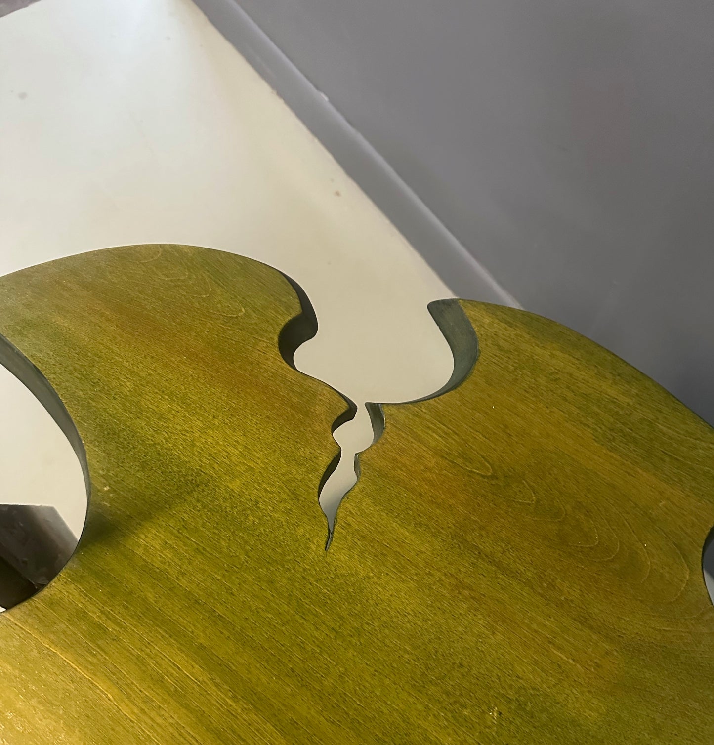 Brutalist handmade coffee table with jagged edges and Asian design elements
