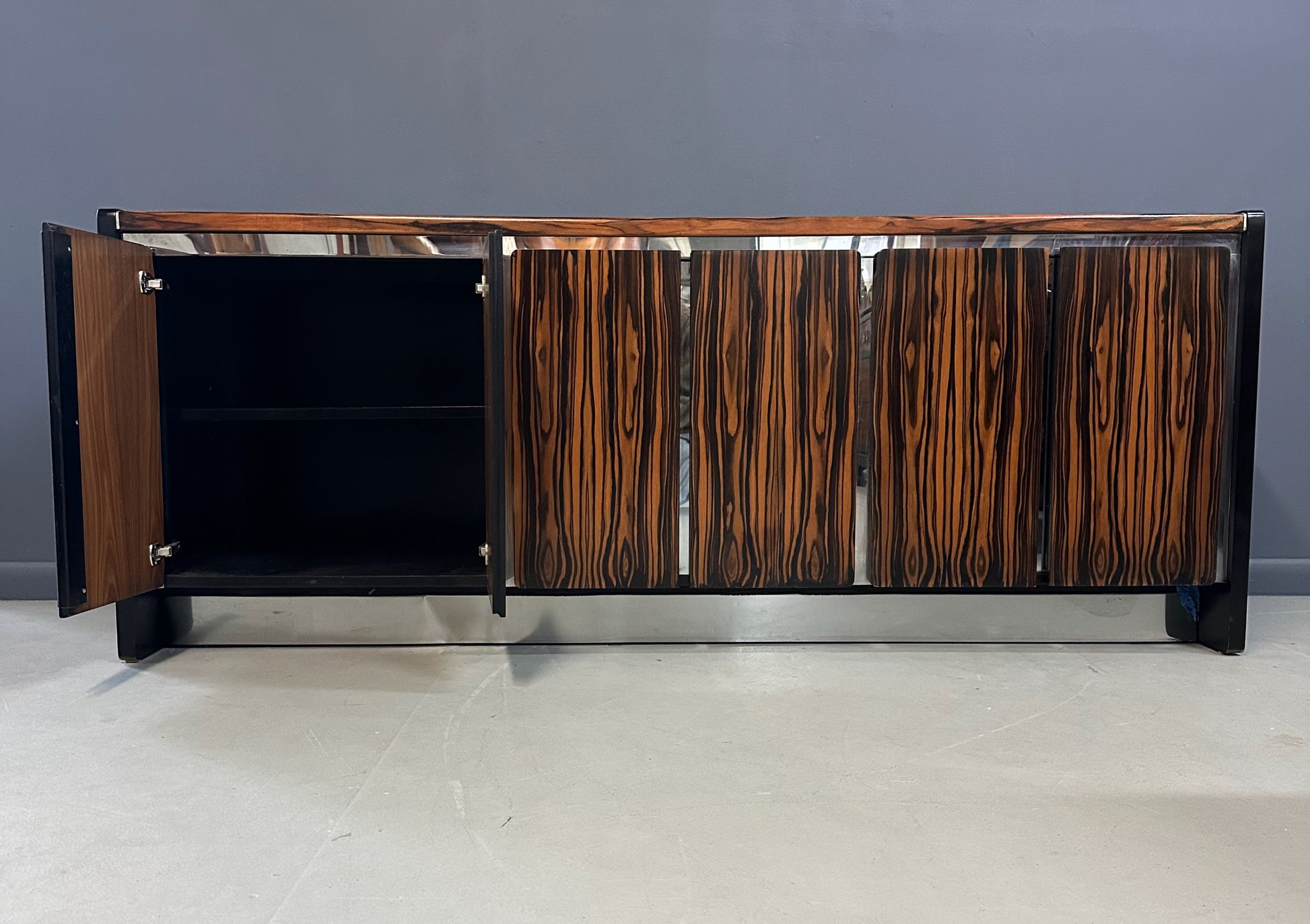 Mid-century modern sideboard with high-gloss Macassar ebony veneer and chrome accent