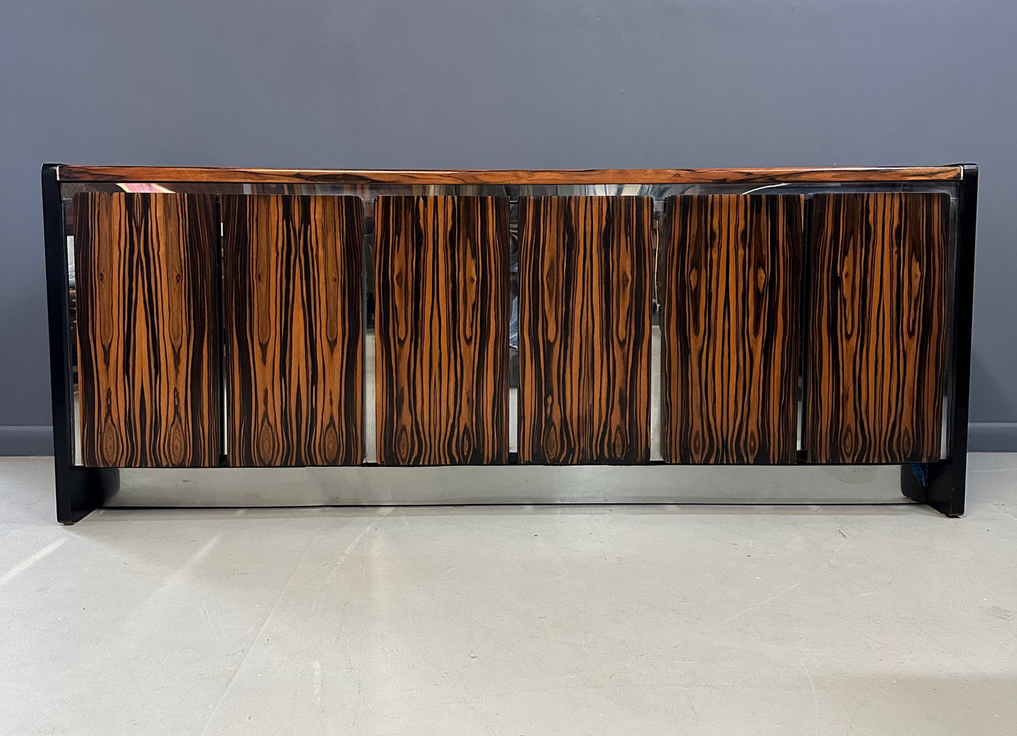 Mid-century modern sideboard with high-gloss Macassar ebony veneer and chrome accent