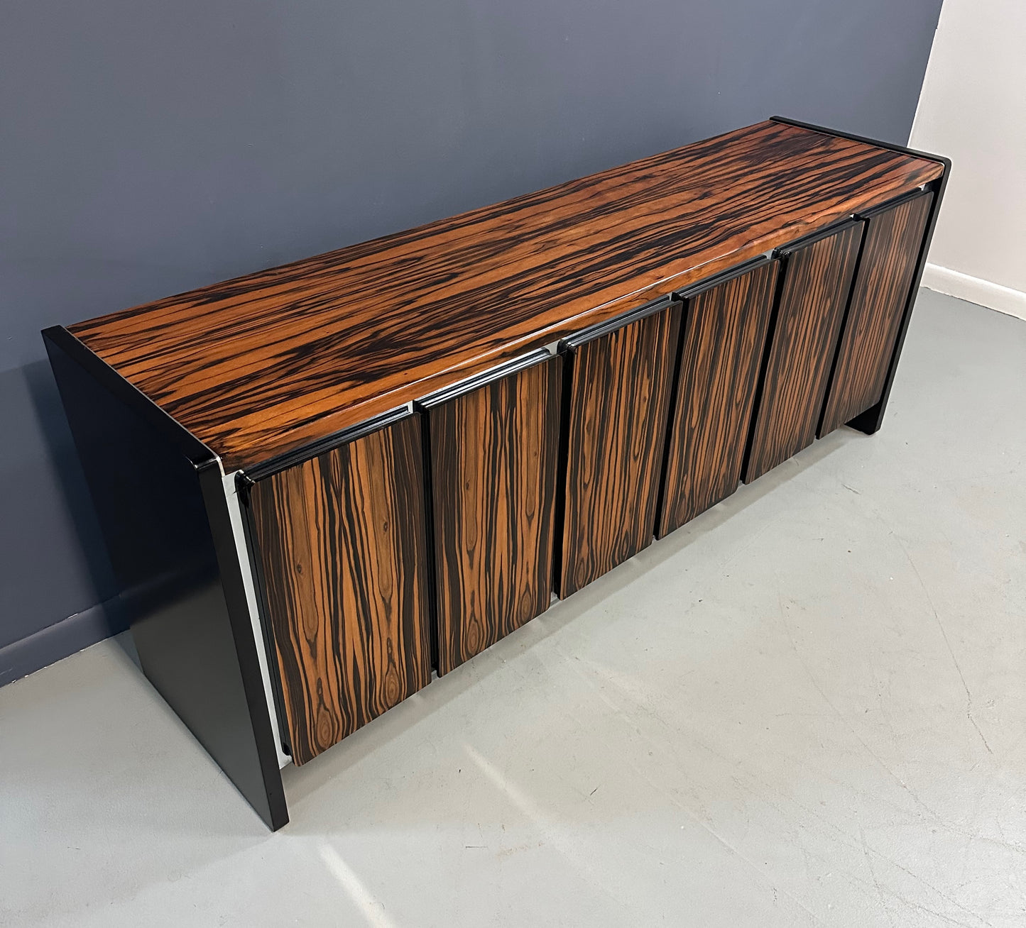 Mid-century modern sideboard with high-gloss Macassar ebony veneer and chrome accent
