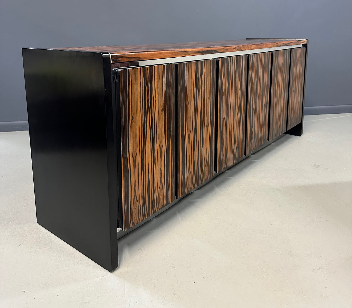 Mid-century modern sideboard with high-gloss Macassar ebony veneer and chrome accent