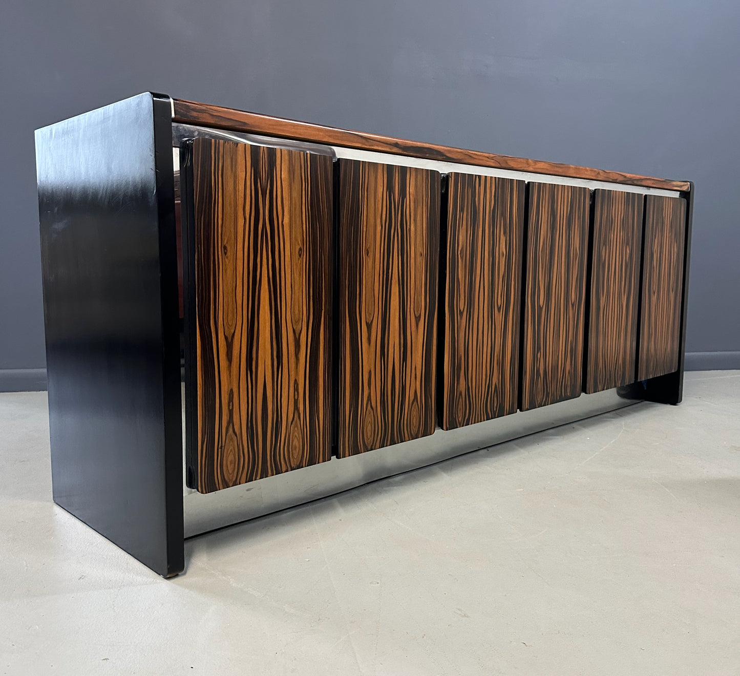 Mid-century modern sideboard with high-gloss Macassar ebony veneer and chrome accent