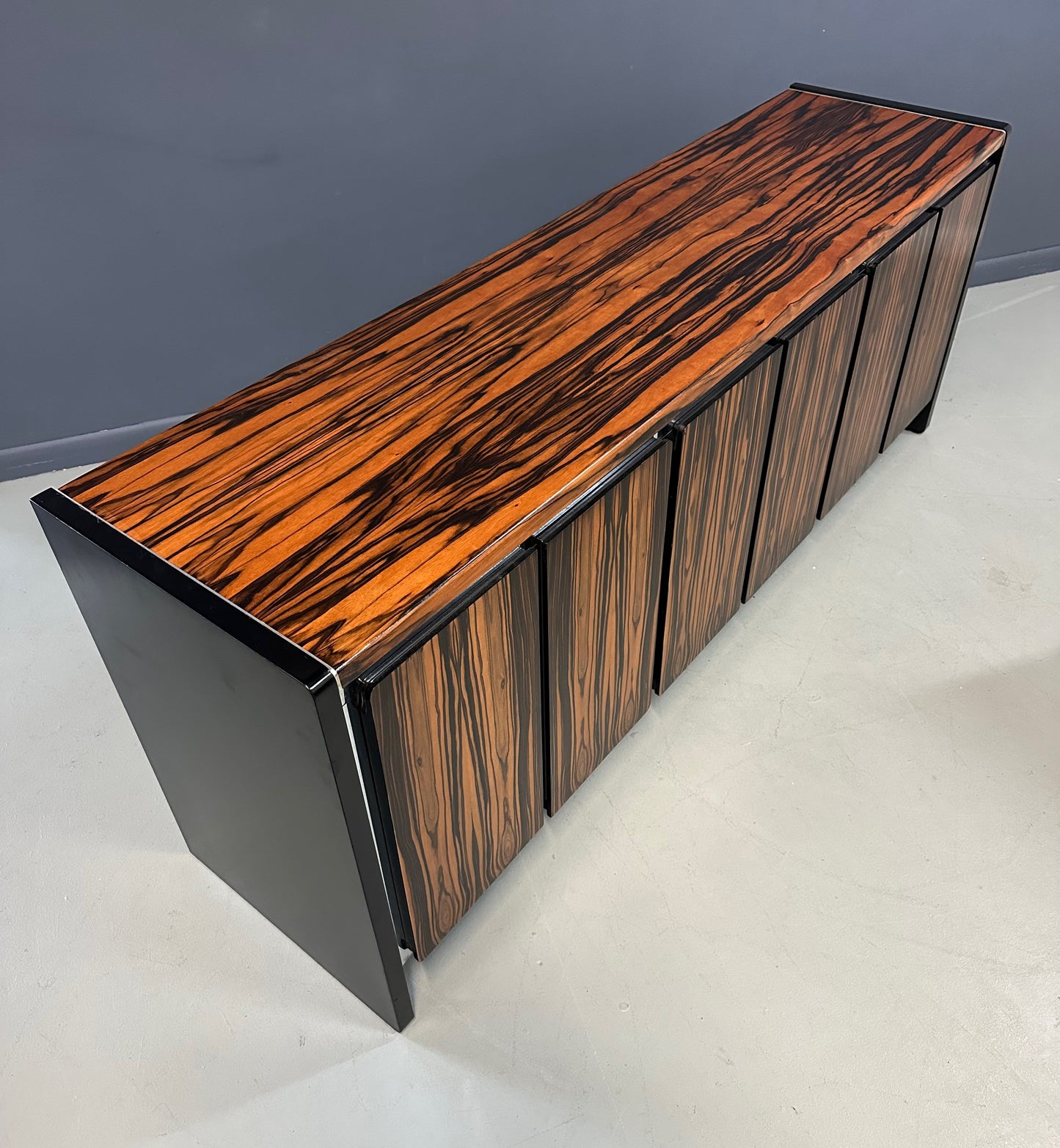 Mid-century modern sideboard with high-gloss Macassar ebony veneer and chrome accent