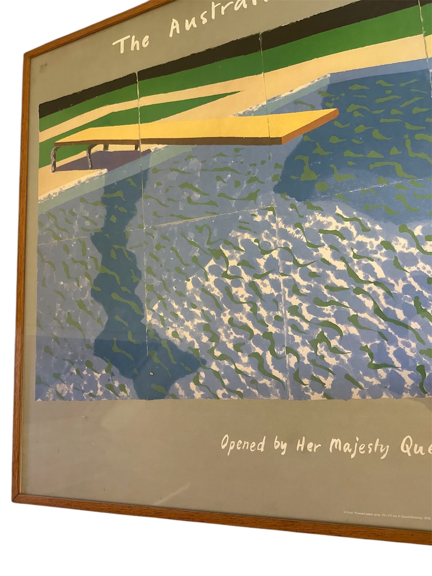 David Hockney lithograph titled 'A Diver' from the 'Paper Pools' series, featuring a swimmer diving into a pool, with inscription noting opening by Her Majesty Queen Elizabeth II on October 12th, 1982.