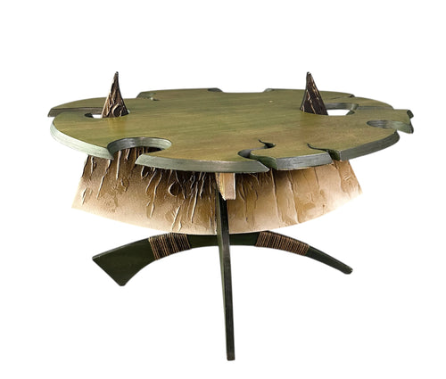 Brutalist handmade coffee table with jagged edges and Asian design elements