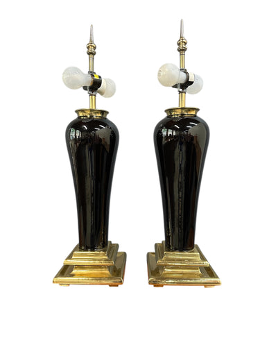 Pair of Hollywood Regency Black Ceramic Urn Lamps with Stepped Brass Bases by Chapman