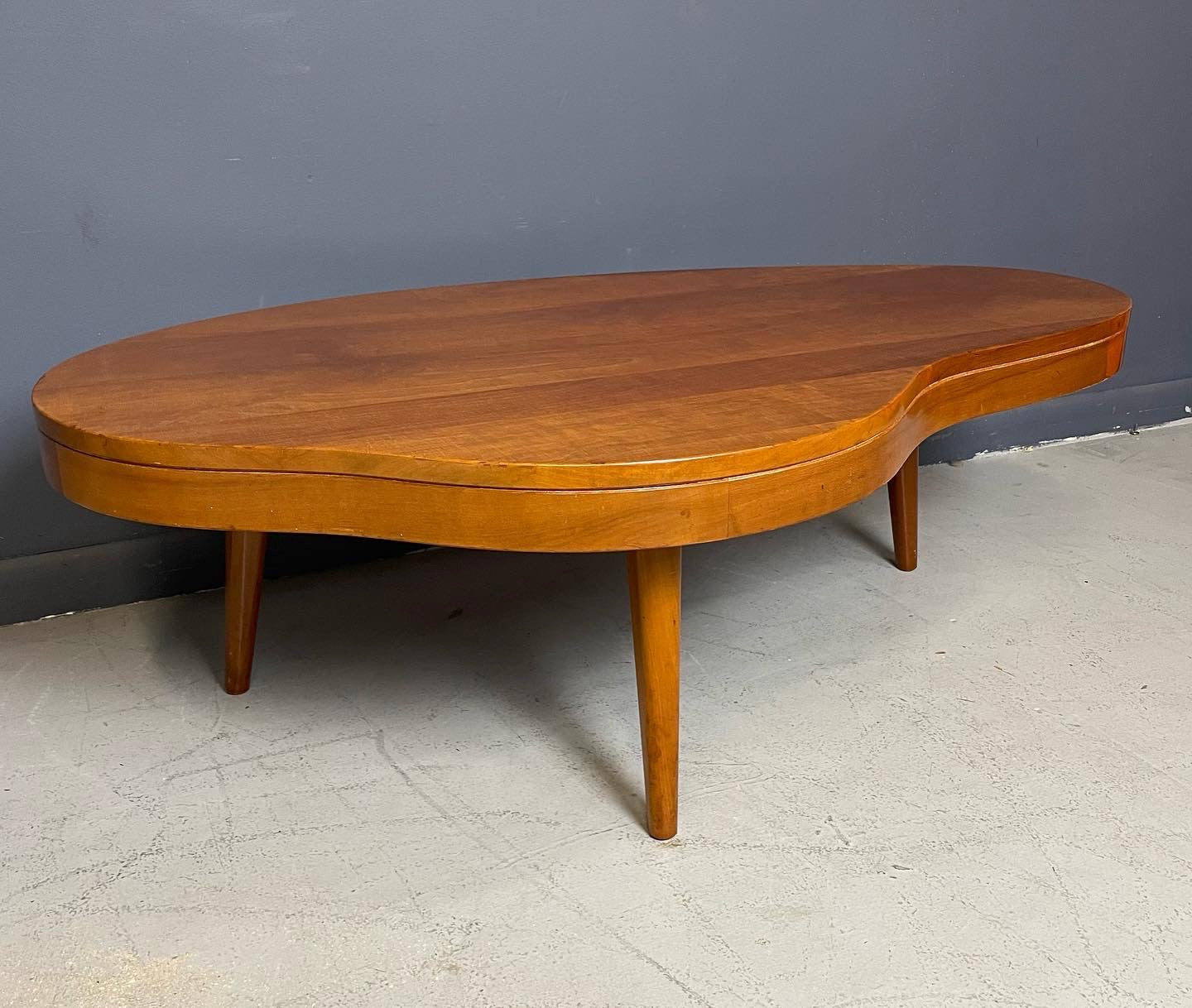 SOLD – Biomorphic Mid Century Coffee Table in the Style of Gibbings in Maple w/Drawer