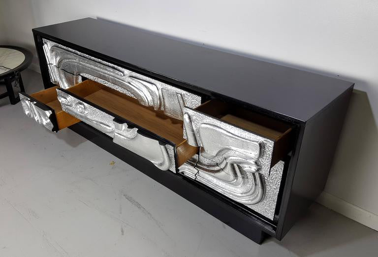 SOLD – Sculptural Ebonized Credenza with Silver Leafed Front
