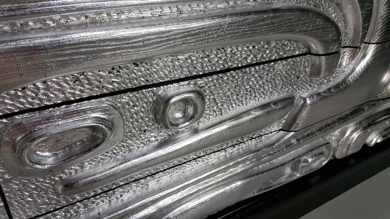 SOLD – Sculptural Ebonized Credenza with Silver Leafed Front