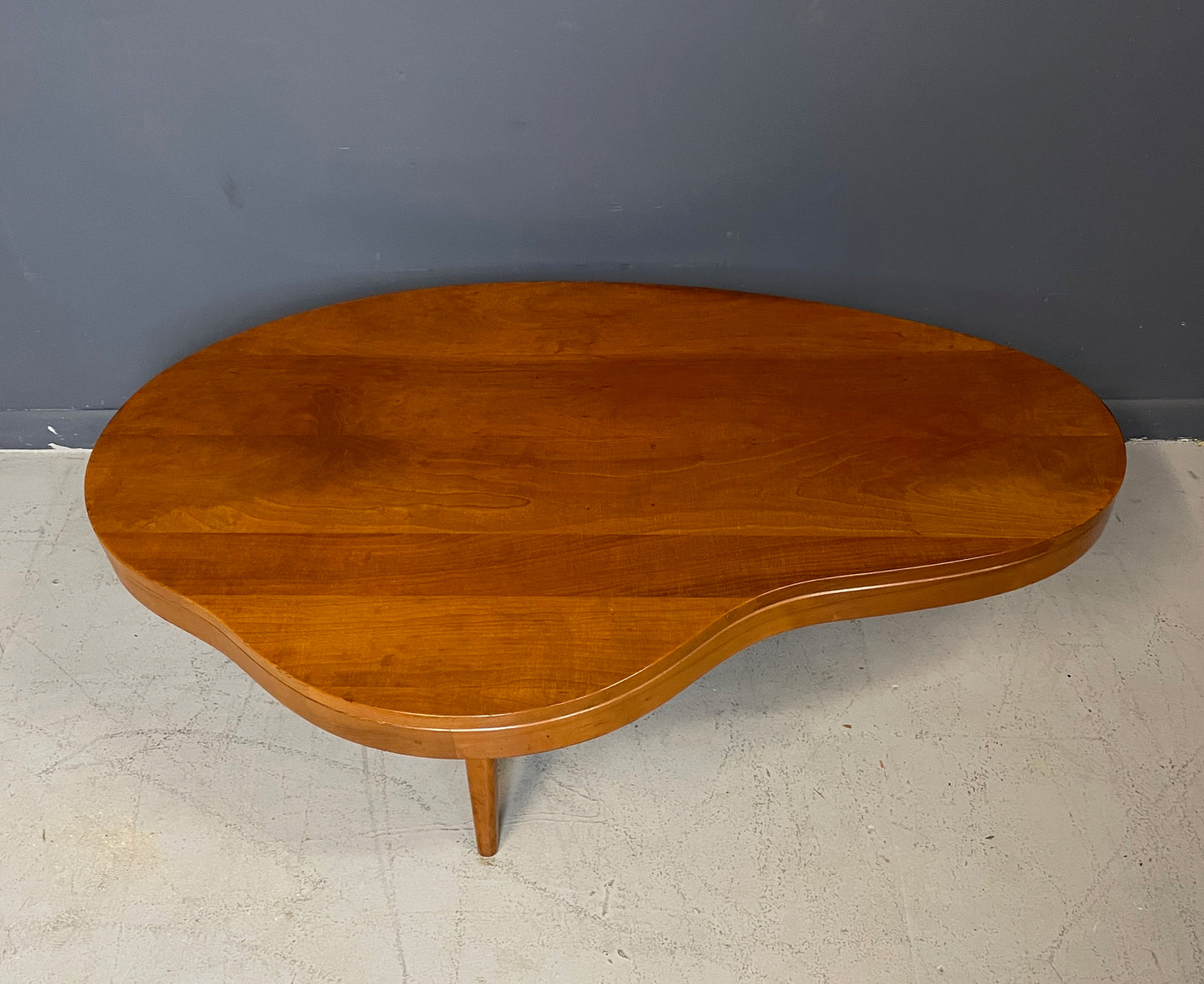SOLD – Biomorphic Mid Century Coffee Table in the Style of Gibbings in Maple w/Drawer