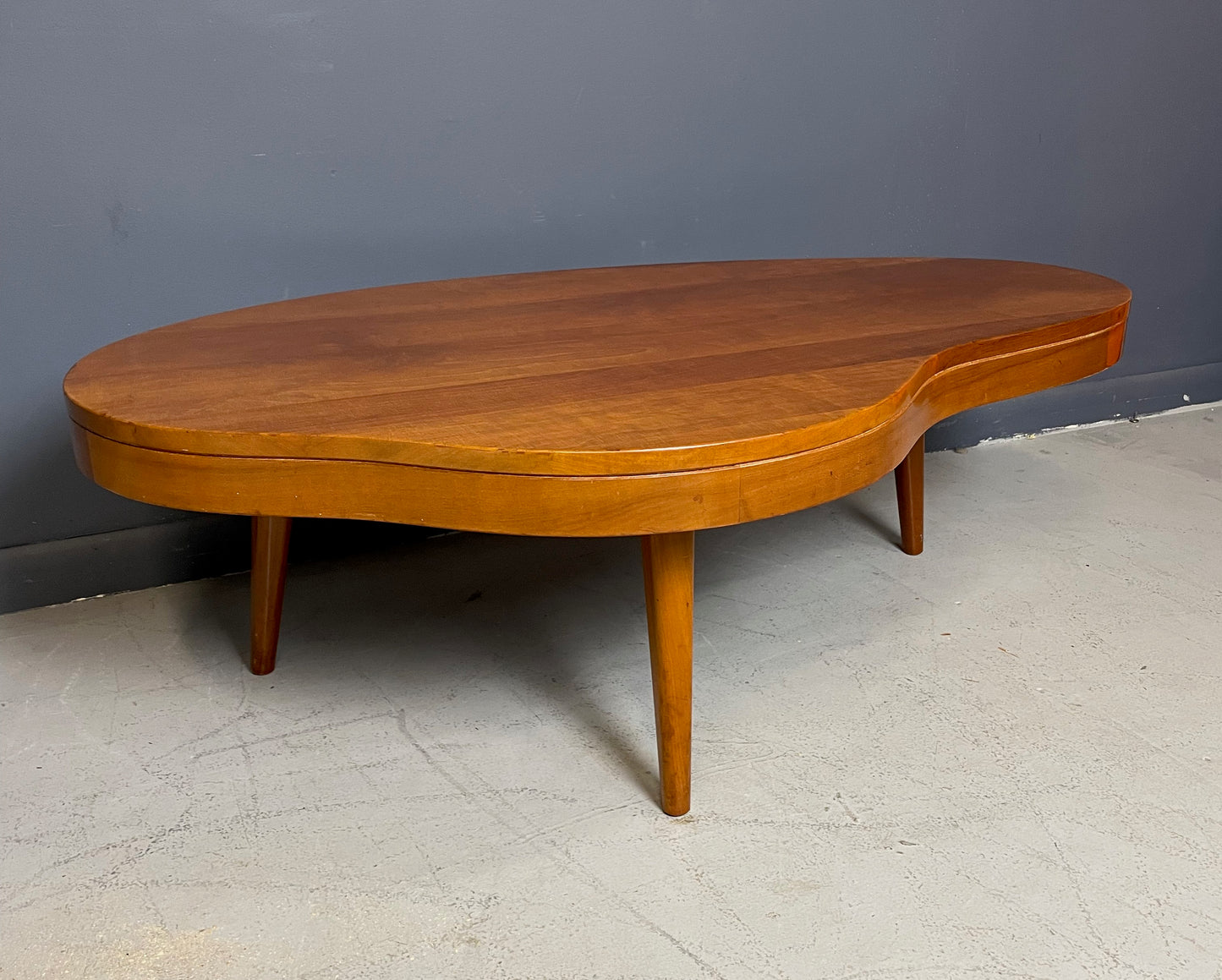 SOLD – Biomorphic Mid Century Coffee Table in the Style of Gibbings in Maple w/Drawer