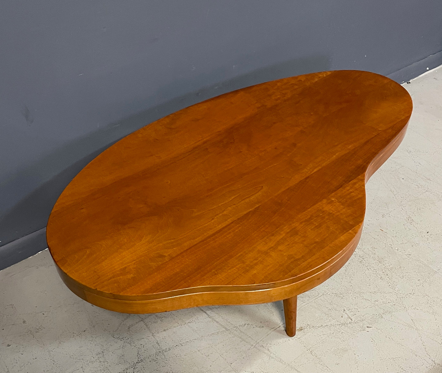 SOLD – Biomorphic Mid Century Coffee Table in the Style of Gibbings in Maple w/Drawer