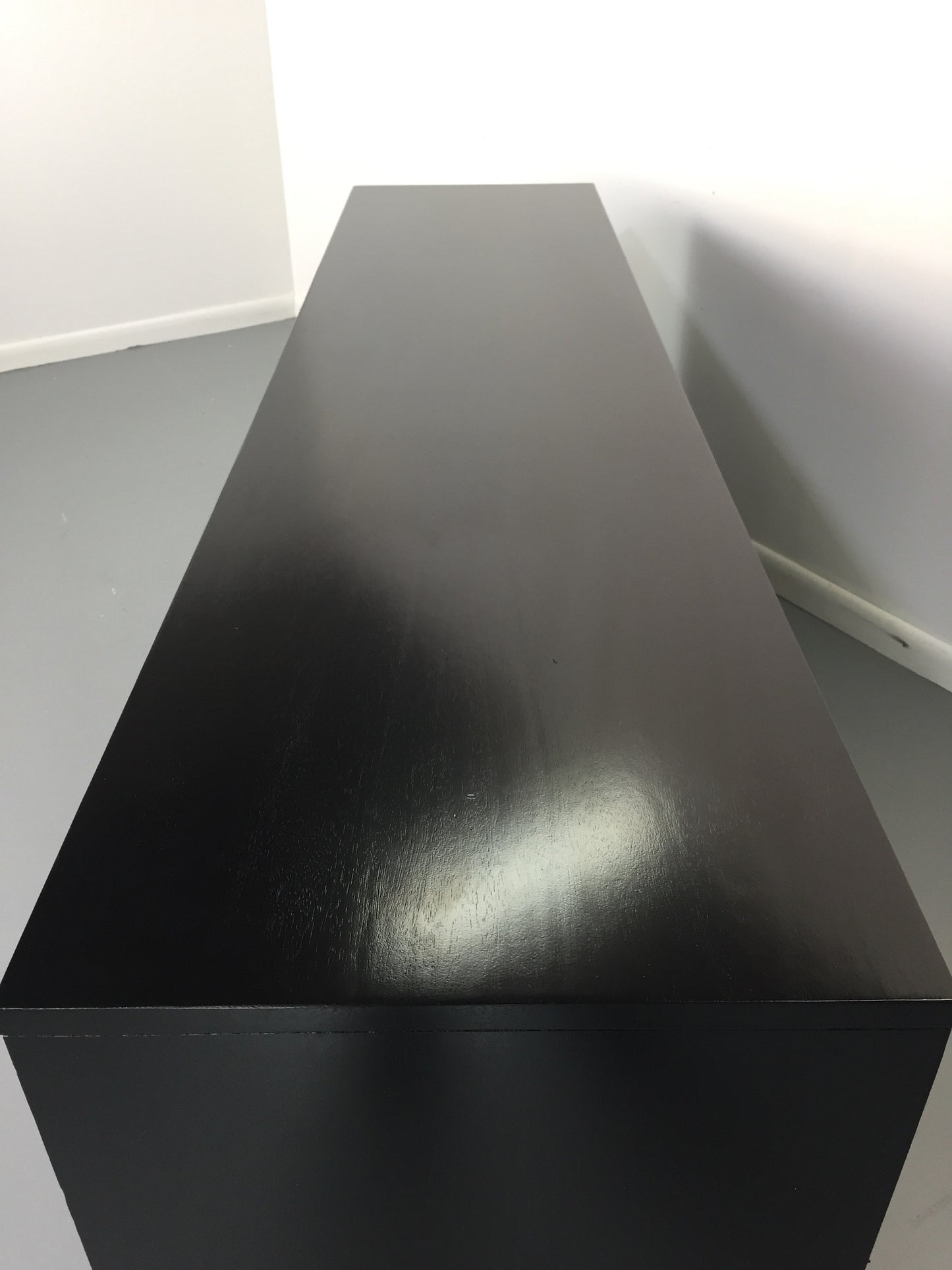 SOLD – Sculptural Ebonized Credenza with Silver Leafed Front
