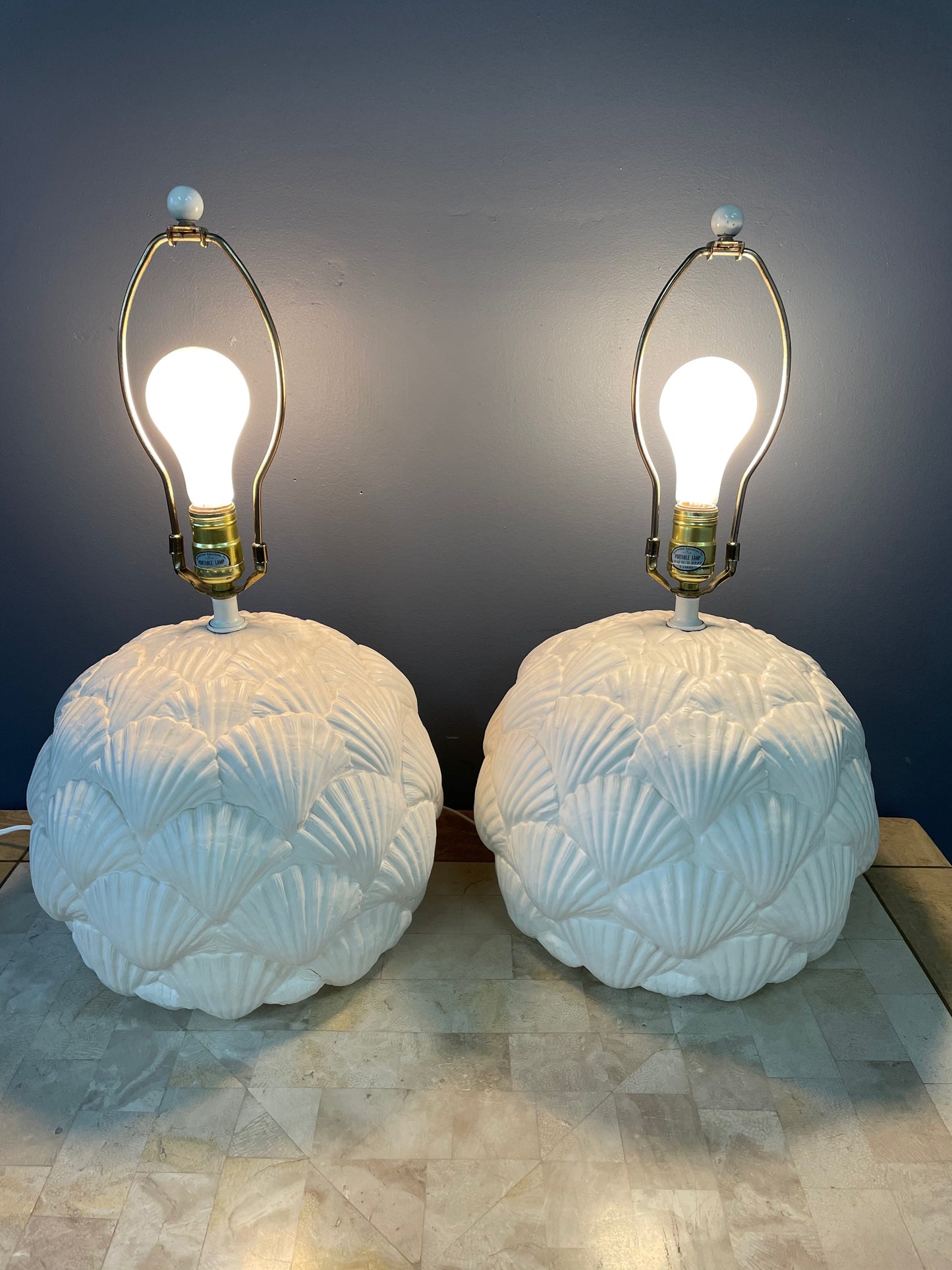 SOLD – Italian White Ceramic Pair of Table Lamps with a Seashell Motif Mid Century