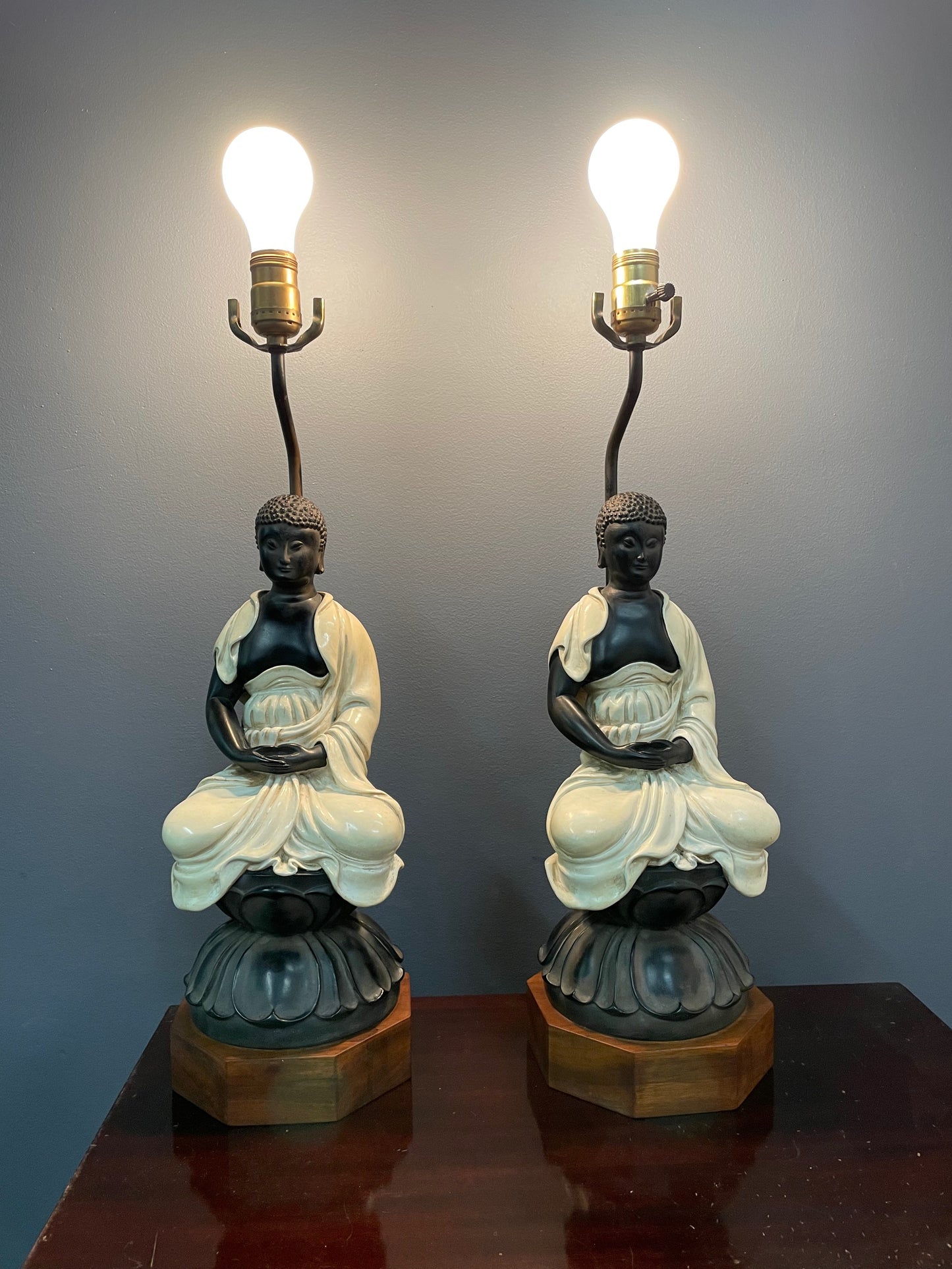 SOLD – Chapman Pair of Ceramic Table Lamps of Sitting Buddhas on a rosewood base
