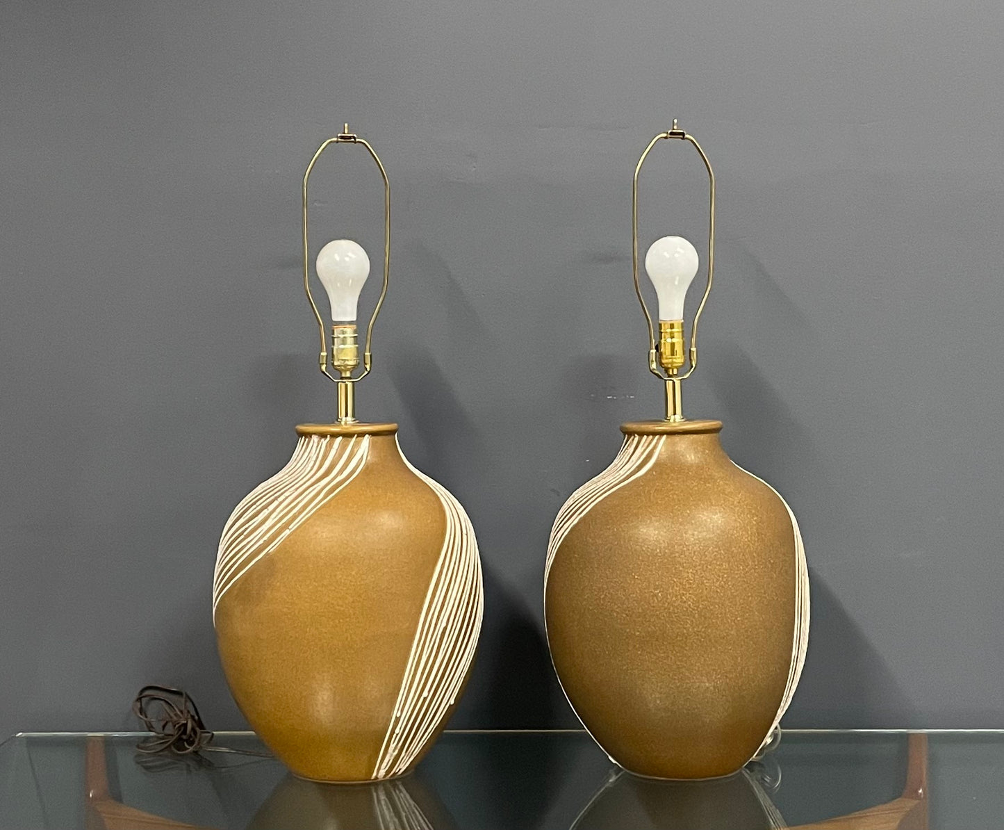 SOLD – Mid Century Pair of Ceramic Caramel Colored Lamps with White Appliquéd Stripes