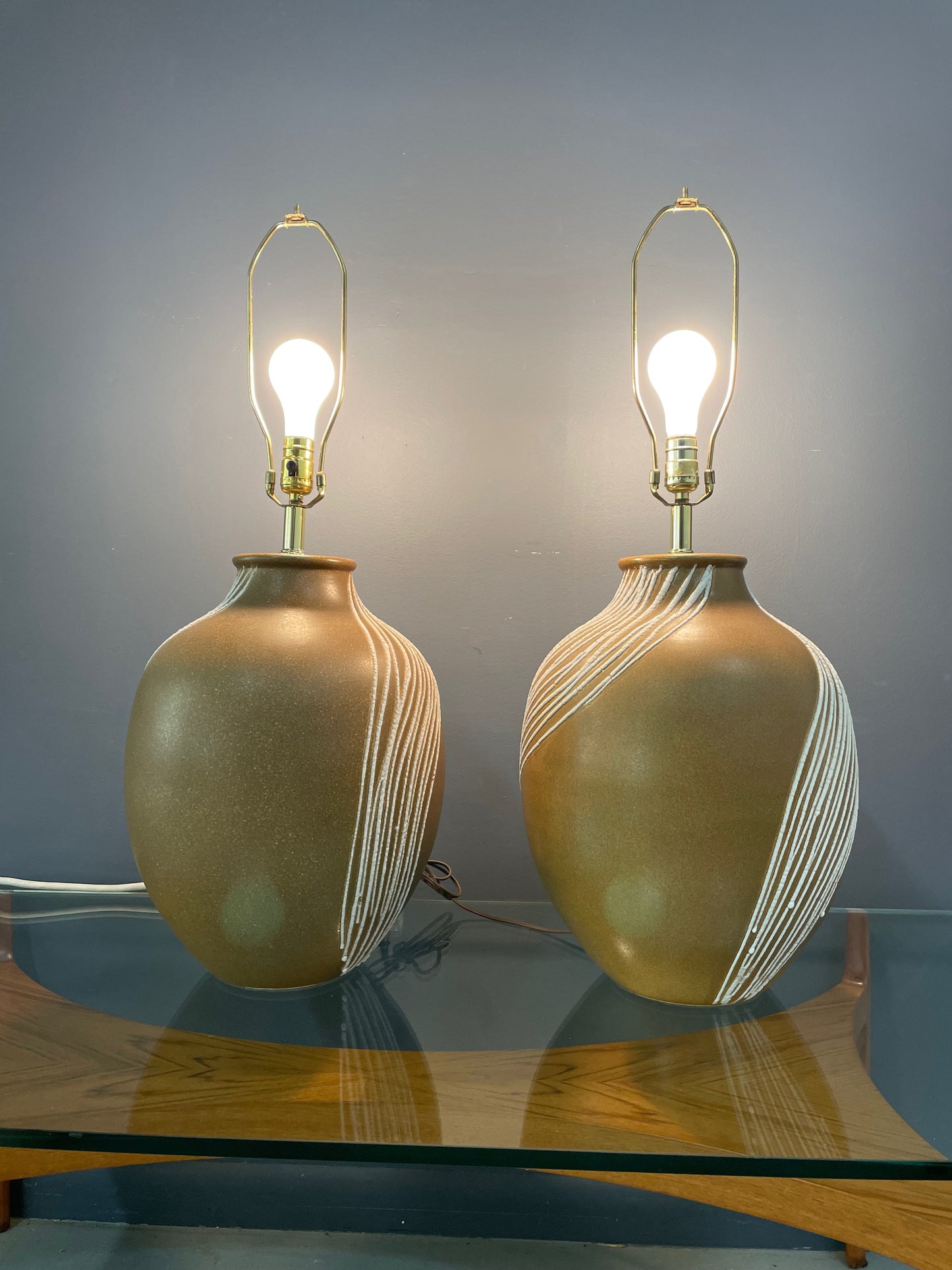 SOLD – Mid Century Pair of Ceramic Caramel Colored Lamps with White Appliquéd Stripes