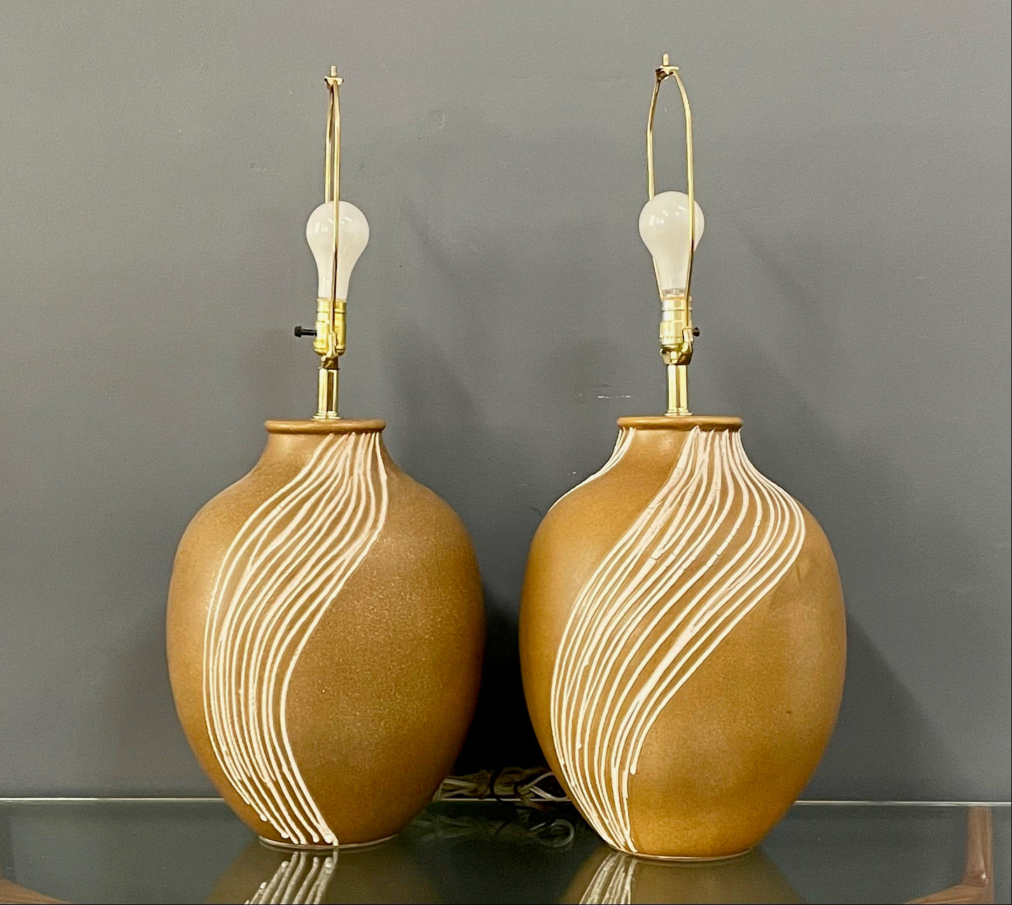 SOLD – Mid Century Pair of Ceramic Caramel Colored Lamps with White Appliquéd Stripes