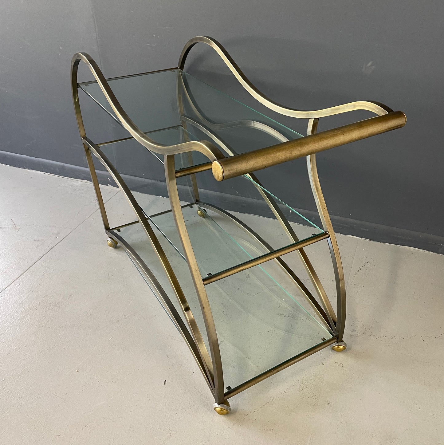 SOLD – Curvaceous Bar Cart in Brass for Design Institute of America by Milo Baughman