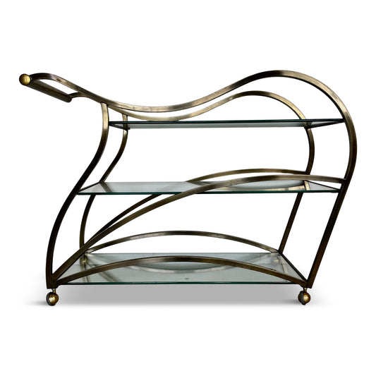SOLD – Curvaceous Bar Cart in Brass for Design Institute of America by Milo Baughman